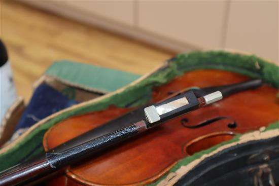 A German three-quarter size violin and bow, cased